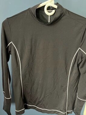 Black Nike golf dry fit long sleeve: women’s medium